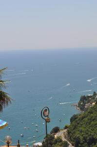 a view of a body of water with boats at villa verde sul mare in Vietri sul Mare