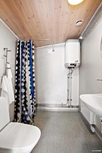 a bathroom with a toilet and a sink at First Camp Gunnarsö-Oskarshamn in Oskarshamn