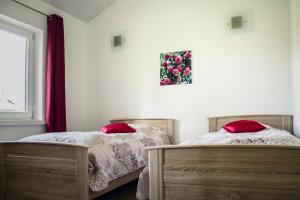 Ένα ή περισσότερα κρεβάτια σε δωμάτιο στο Ferienhäuser Armsen