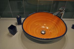 a large wooden bowl sink in a bathroom at villa verde sul mare in Vietri sul Mare