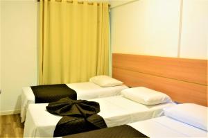 Letto o letti in una camera di Classe Apart Hotel