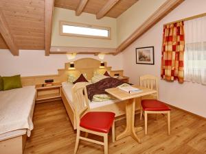 Postel nebo postele na pokoji v ubytování Gästehaus Renate