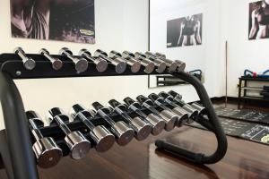 a rack of dumbbells on top of a table at Grand Hotel Passetto in Ancona