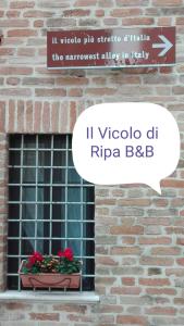 Ein Zertifikat, Auszeichnung, Logo oder anderes Dokument, das in der Unterkunft Il Vicolo di Ripa B&b ausgestellt ist
