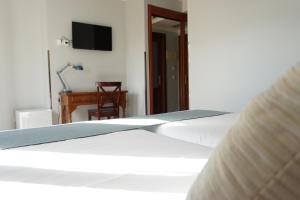 Ένα ή περισσότερα κρεβάτια σε δωμάτιο στο Villa Soledad