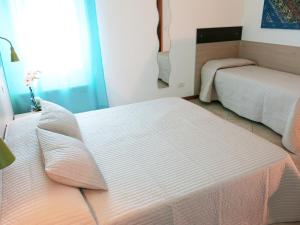 A bed or beds in a room at Residence Amarein