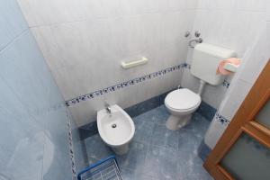 Ein Badezimmer in der Unterkunft Apartments Daria