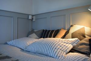 A bed or beds in a room at Gellért Hill Apartment