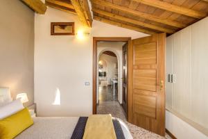 Posteľ alebo postele v izbe v ubytovaní AwesHomeItaly - Lungarno Bellavista Penthouse