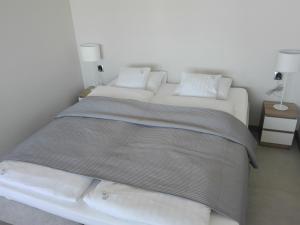 Posteľ alebo postele v izbe v ubytovaní Willa Dobryłko II -Apartamenty