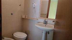 Koupelna v ubytování Albergo Casa Lupi + 17 fotografií