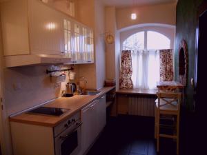 Kuchyň nebo kuchyňský kout v ubytování Apartament Katowice - Nikiszowiec