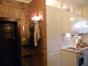 Kuchyň nebo kuchyňský kout v ubytování Apartament Katowice - Nikiszowiec