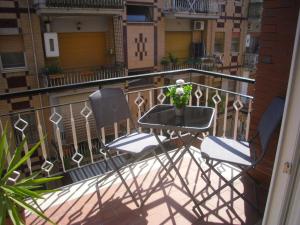 A balcony or terrace at Lovely Little Apartment in Via Aurelia