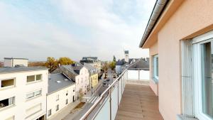 Balkón nebo terasa v ubytování 2 Bedroom Penthouse in Gasperich + 10 fotografií
