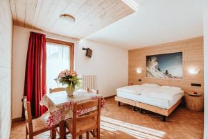 Posteľ alebo postele v izbe v ubytovaní Gaia Residence Hotel