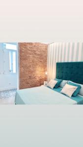 Postel nebo postele na pokoji v ubytování Apartamento Frederick “Centrico y con Clase”