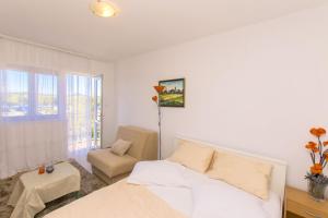 Postel nebo postele na pokoji v ubytování Apartment Nediljka