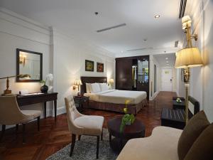 Ένα ή περισσότερα κρεβάτια σε δωμάτιο στο Silk Path Boutique Hanoi