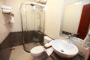 Koupelna v ubytování Manorom Boutique Hotel