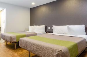 Postel nebo postele na pokoji v ubytování Studio 6-Fresno, CA - Extended Stay
