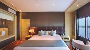 Ramada by Wyndham Alleppey客房内的一张或多张床位
