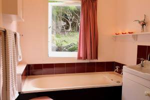Vannituba majutusasutuses Te Hapu Coastal Cottages