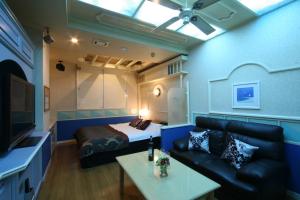 TV a/nebo společenská místnost v ubytování Restay Kokura (Adult Only)