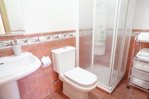 Koupelna v ubytování Housingleón - Conde Duplex con garaje gratuito + 7 fotografií