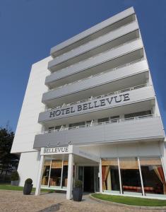 a building with a hotel bellevue written on it at Hotel Bellevue in Timmendorfer Strand