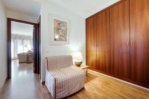 Un pat sau paturi într-o cameră la Apartament les Terrasses