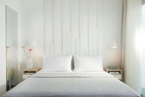 Postel nebo postele na pokoji v ubytování Hotel Alkyonis