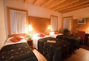 Postelja oz. postelje v sobi nastanitve Borgo Ronchetto