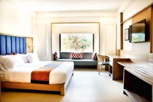 Purple Cloud Hotel客房内的一张或多张床位