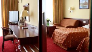 Postel nebo postele na pokoji v ubytování Hotel Lidia Spa & Wellness