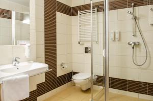 Koupelna v ubytování Hotel Lidia Spa & Wellness