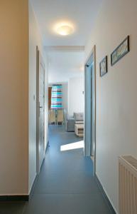 Łóżko lub łóżka w pokoju w obiekcie Apartamenty Pod Izbicą