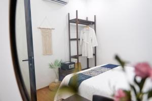 Postel nebo postele na pokoji v ubytování Phuong Tran Apartment and Hotel