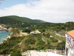 a view of a town and a body of water at Nicolas Rooms in Fiskardo