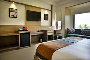 Purple Cloud Hotel客房内的一张或多张床位
