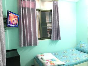 TV a/nebo společenská místnost v ubytování NAT 2 Guest House
