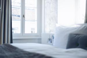Postelja oz. postelje v sobi nastanitve Hotel Rössli