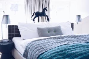 Postelja oz. postelje v sobi nastanitve Hotel Rössli