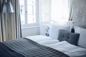 Postelja oz. postelje v sobi nastanitve Hotel Rössli