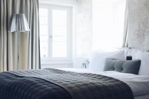 Postelja oz. postelje v sobi nastanitve Hotel Rössli