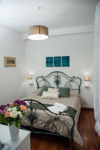 Postel nebo postele na pokoji v ubytování B&B Cuor Di Rione