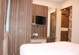 Postel nebo postele na pokoji v ubytování Hotel Angina