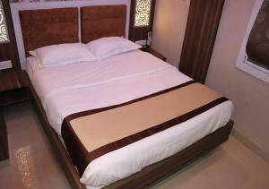Postel nebo postele na pokoji v ubytování Hotel Angina