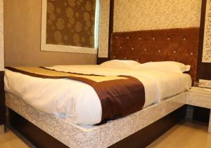 Postel nebo postele na pokoji v ubytování Hotel Angina