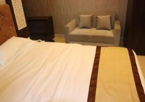 Postel nebo postele na pokoji v ubytování Hotel Angina